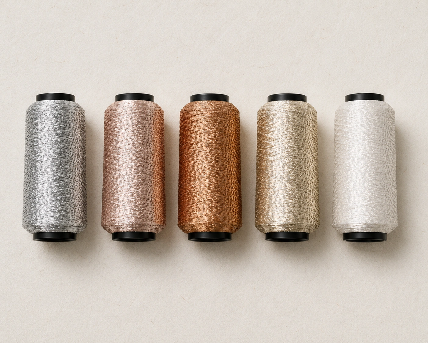 Metallic yarn cones in silver, rose gold, copper, champagne and pearl